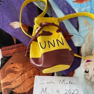 Loungefly Winnie the Pooh honey pot side bag, warning slight damage.